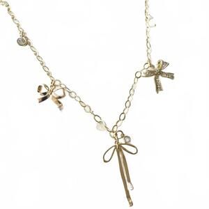 NEW VB & CO. women's bow ribbon necklace in gold